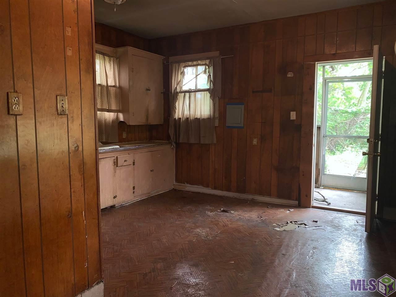 706 Pintail Street Baton Rouge, LA 70807 - Photo 6 of 14 The Kitchen Opens to the Back Patio