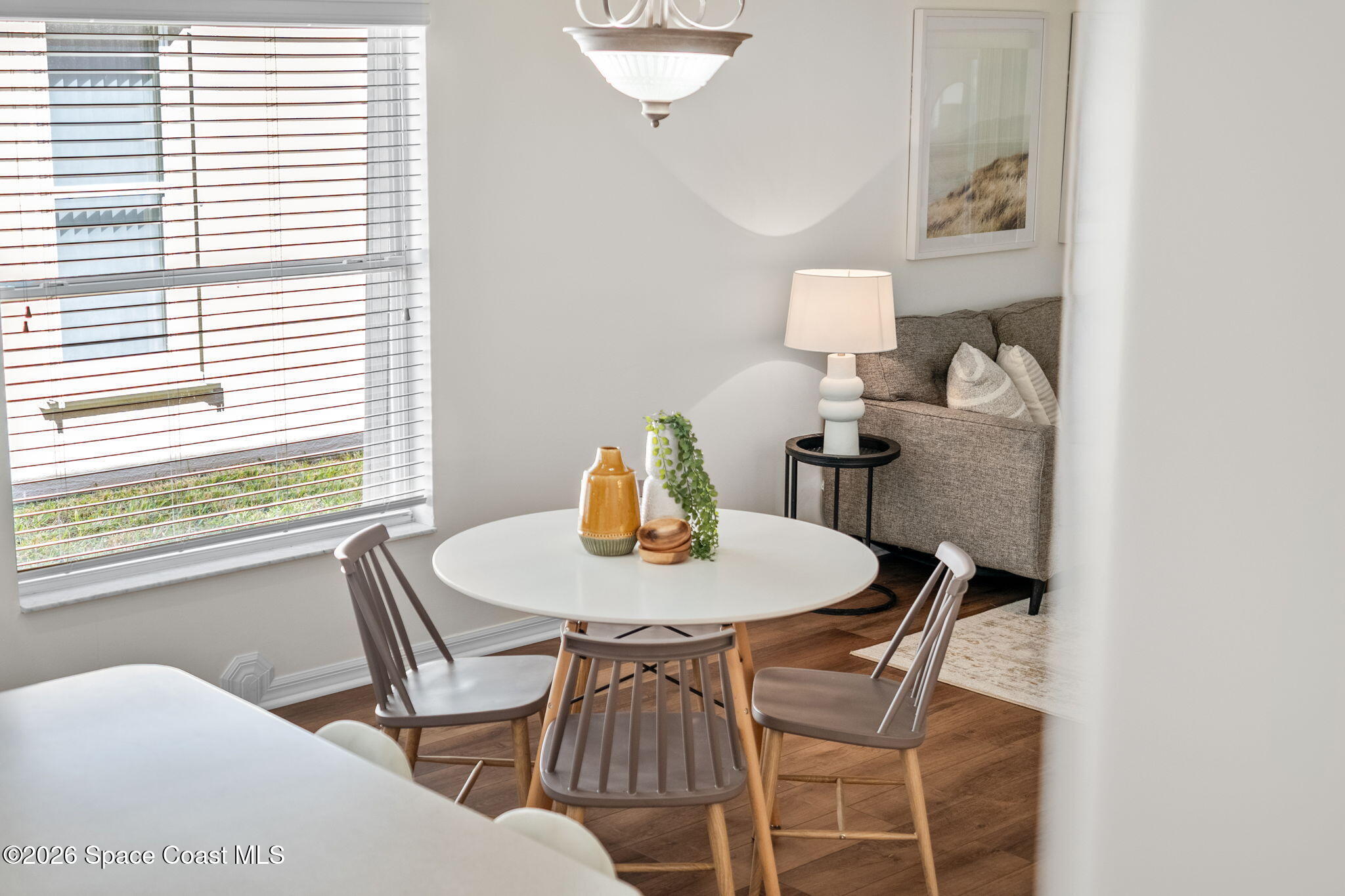 1634 Timacuan Drive Melbourne, FL 32940 - Photo 29 of 77 a dining room with furniture and window