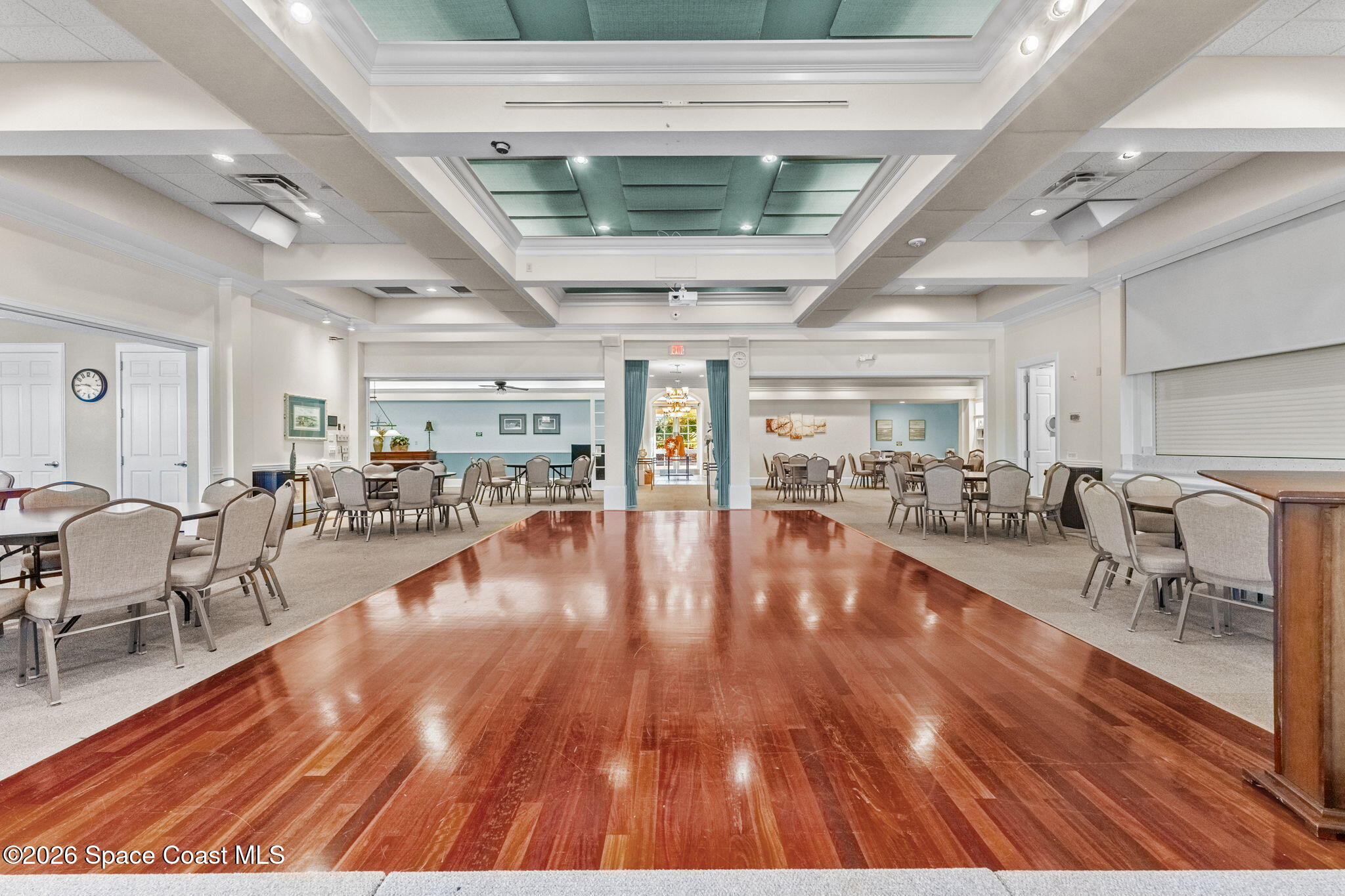 1634 Timacuan Drive Melbourne, FL 32940 - Photo 66 of 77 a view of a patio with dining table and chairs with wooden floor