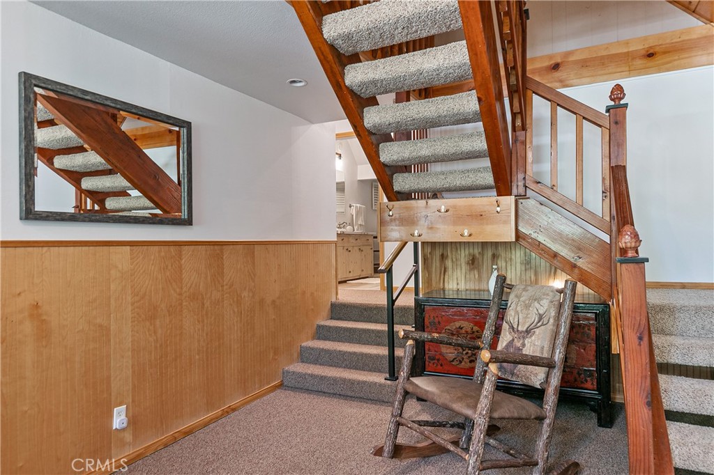 841 Cottage Grove Road Lake Arrowhead, CA 92352 - Photo 9 of 31 few steps to bedroom and stairs to the Loft