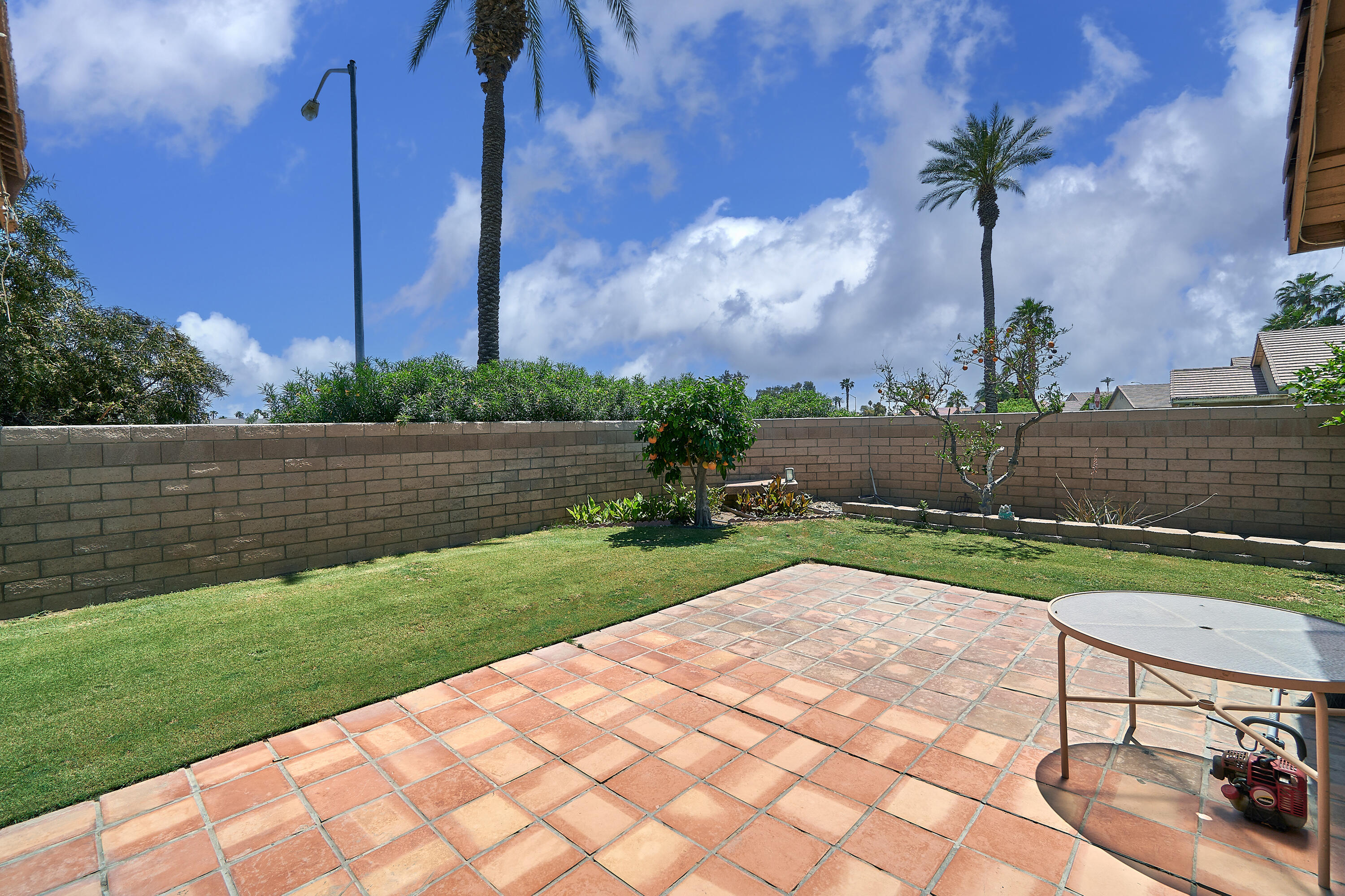 44146 Cassia Drive Indio, CA 92201 - Photo 20 of 20 a view of a backyard with a garden