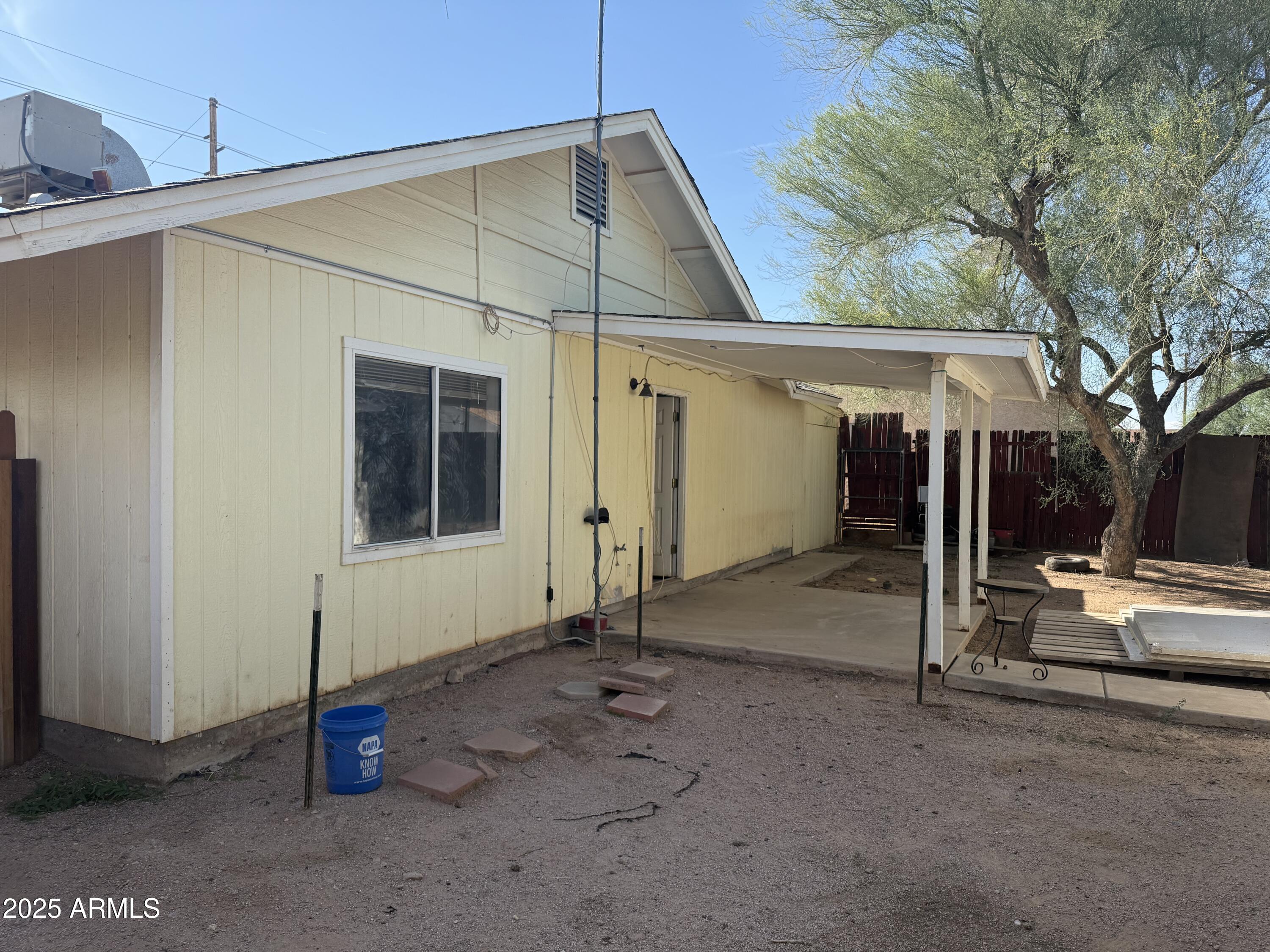 11020 East University Drive Apache Junction, AZ 85120 - Photo 8 of 9 a view of a house with backyard