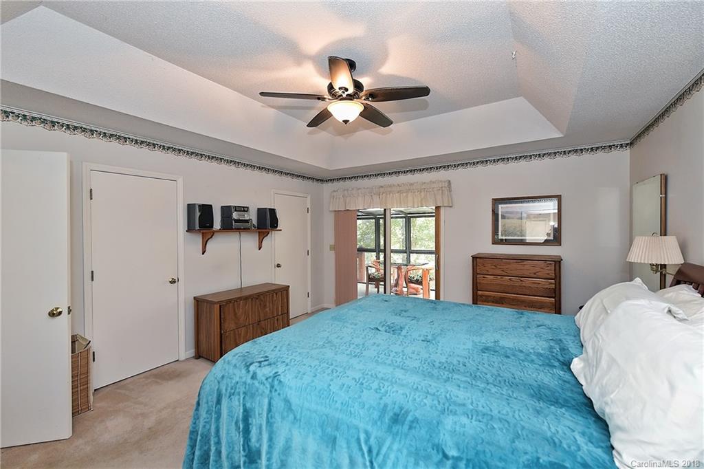 2003 Marquesas Avenue Tega Cay, SC 29708 - Photo 14 of 32 a bedroom with a bed dresser and a window