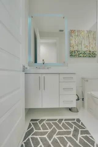 a view of storage and utility room with washer and dryer