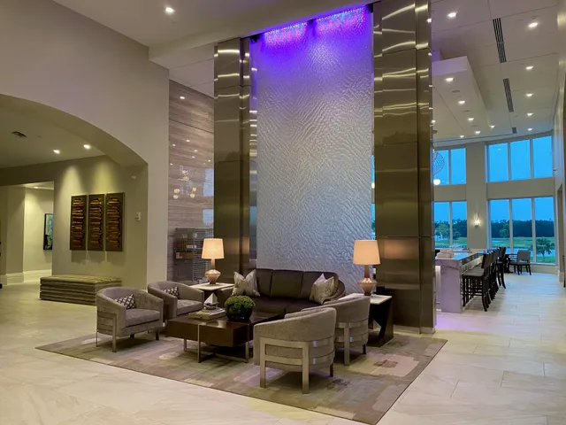 a group of people sitting in a living room