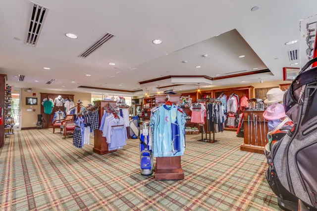 a bedroom with a bed and a mirror