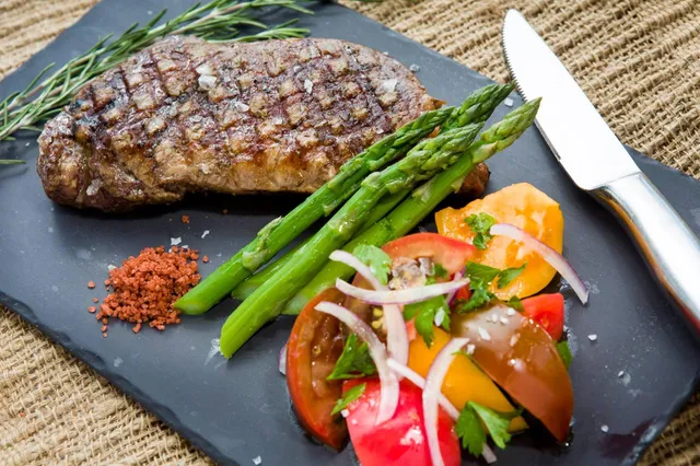 a view of a chairs and table in the patio