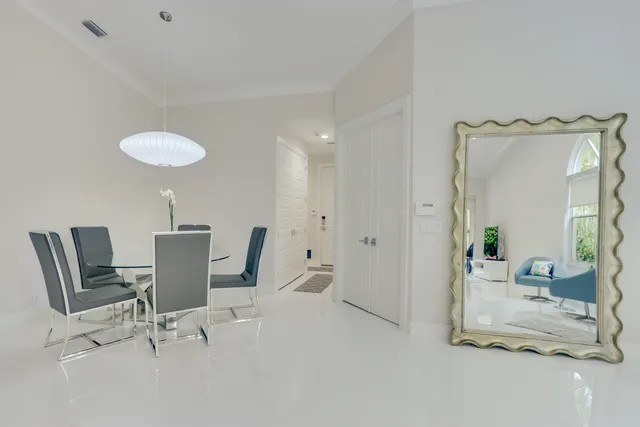 a bedroom with a bed and a television