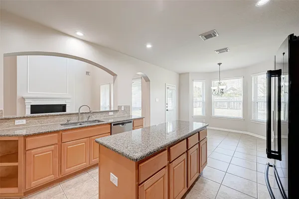 a living room with furniture and window