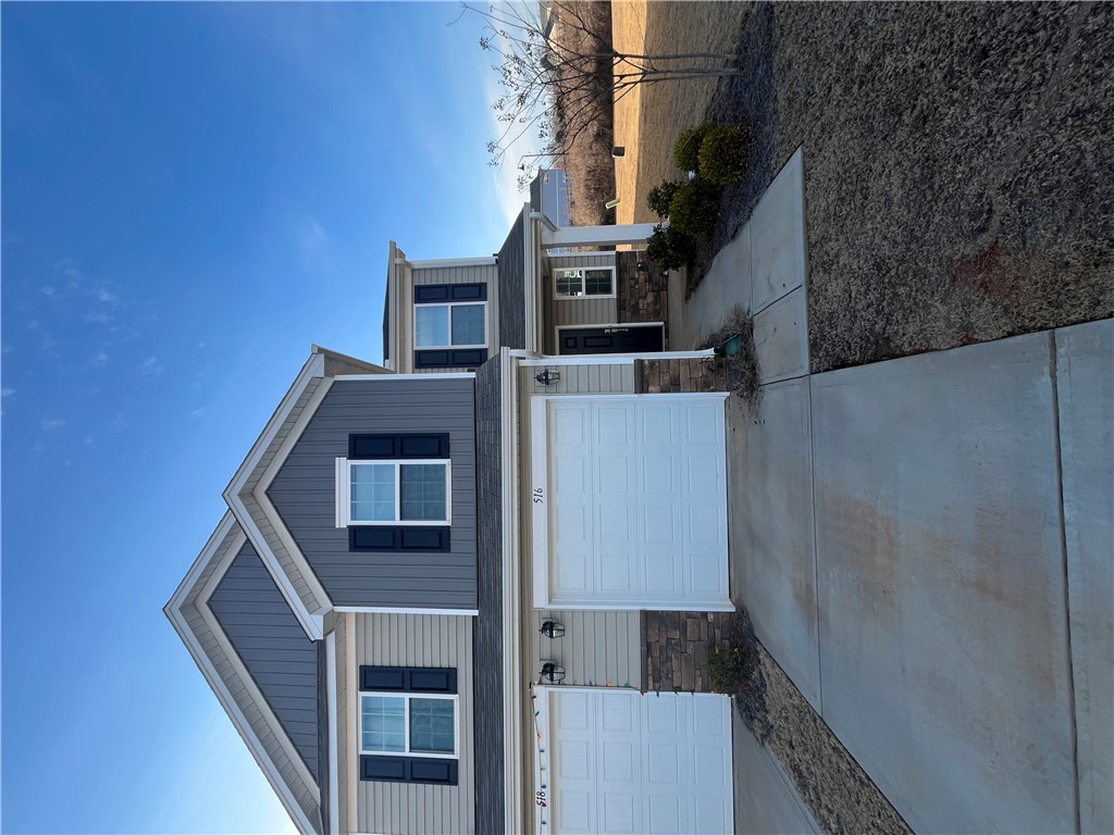 516 Brasstown Court Pendleton, SC 29670 - Photo 2 of 23 One car garage with enough driveway to park a second one if needed.