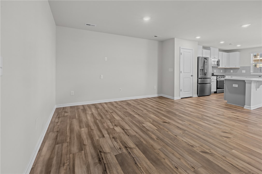 516 Brasstown Court Pendleton, SC 29670 - Photo 8 of 23 This inviting space seamlessly blends living and kitchen areas, featuring sleek finishes and ample natural light because it is an end until