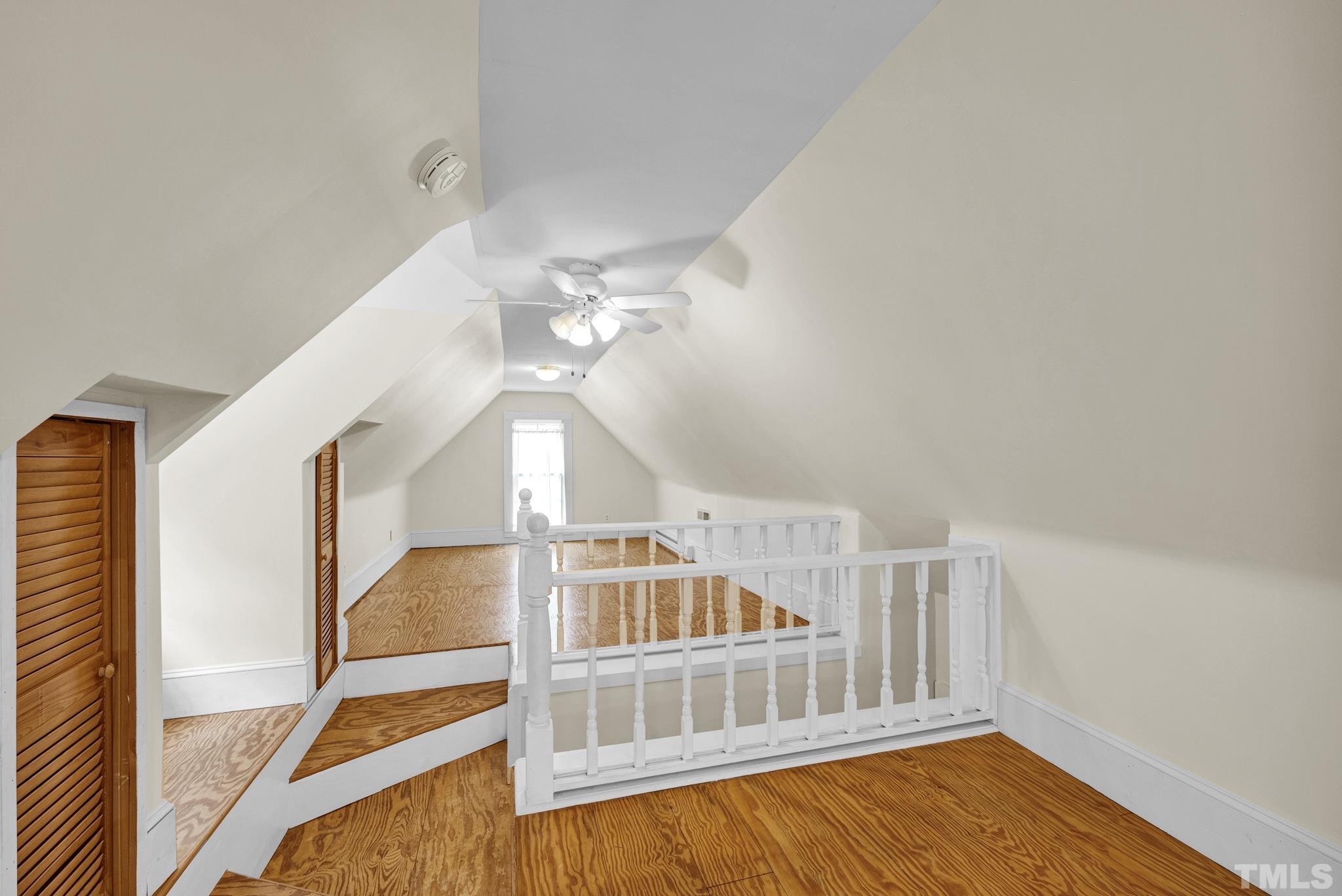 545 East Jones Street Raleigh, NC 27601 - Photo 32 of 35 wooden floor in an empty room with a window