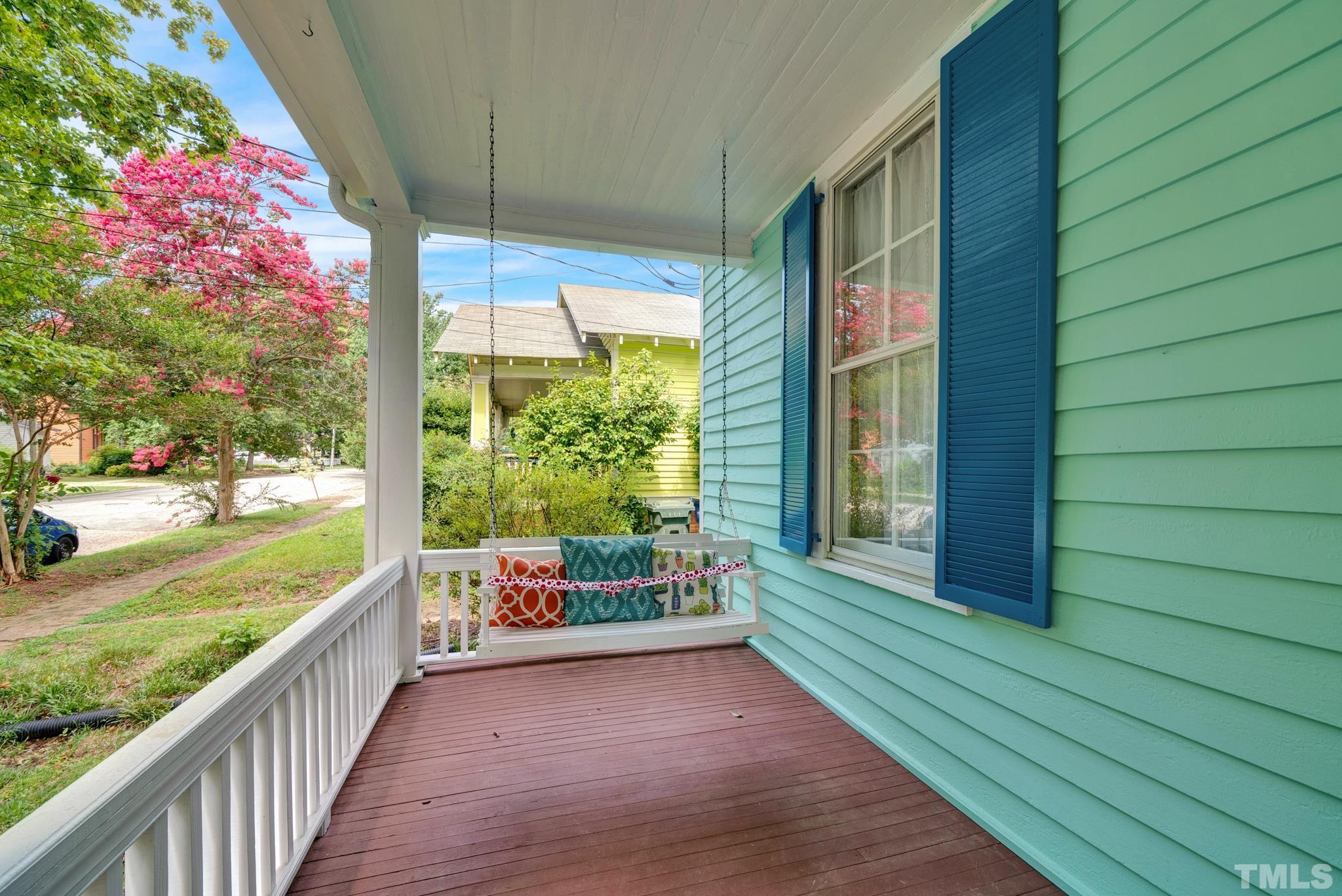 545 East Jones Street Raleigh, NC 27601 - Photo 5 of 35 a balcony with wooden floor