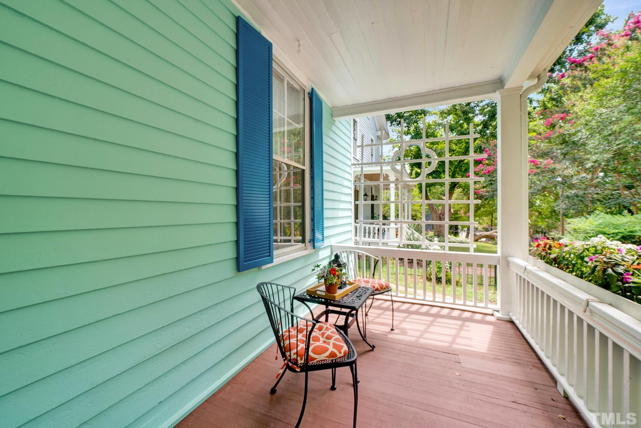 545 East Jones Street Raleigh, NC 27601 - Photo 6 of 35 a view of a chair and table in the balcony