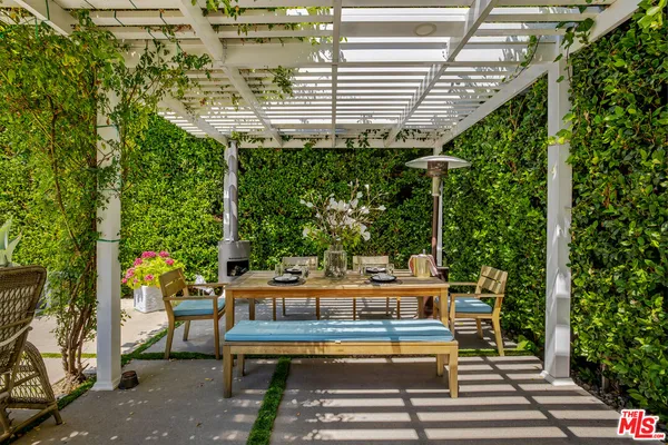a view of a balcony with chairs