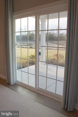 a bedroom with a large bed and a couch