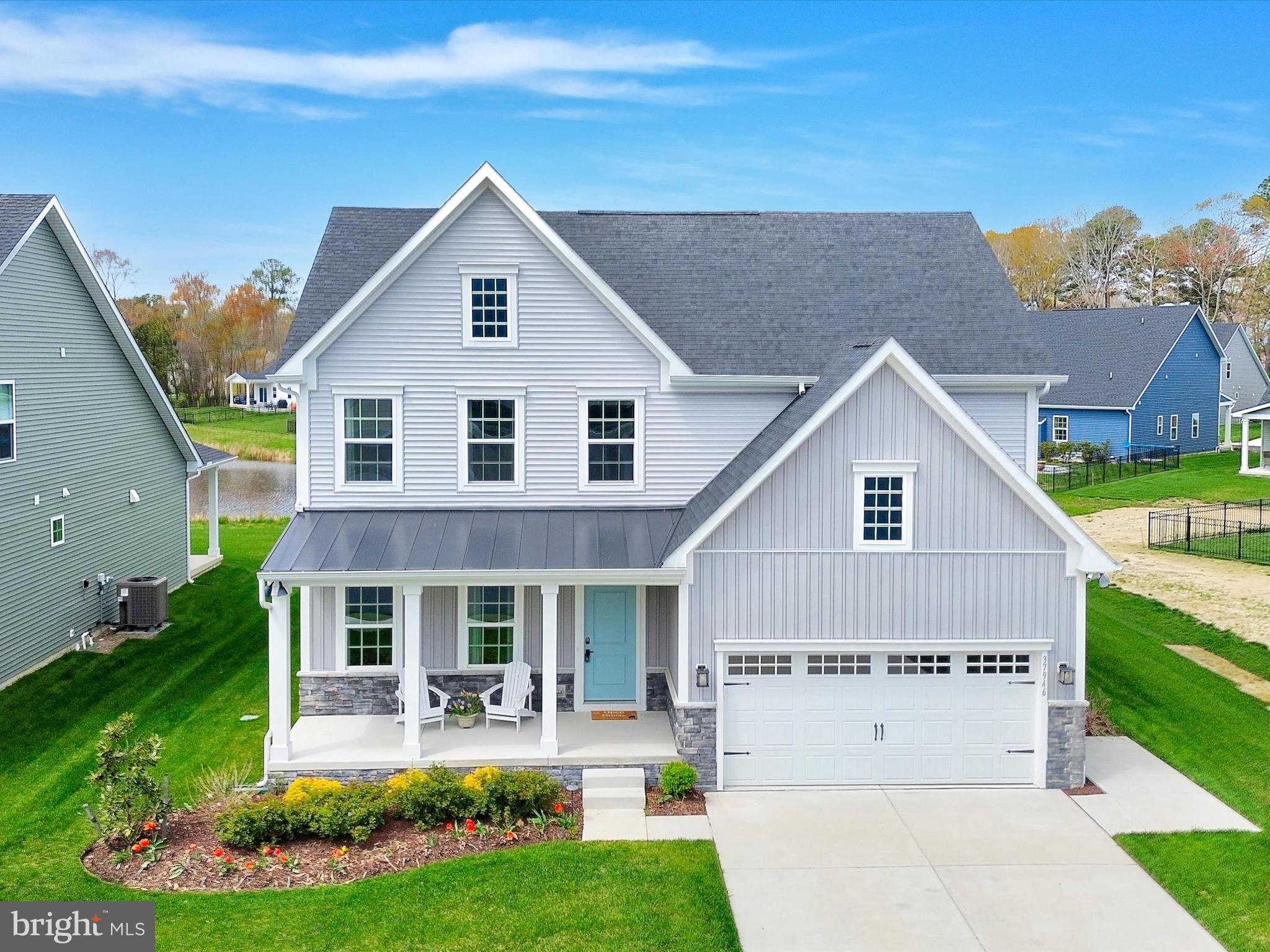 37946 Oneida Way Frankford, DE 19945 - Photo 20 of 29 a front view of house with yard and green space