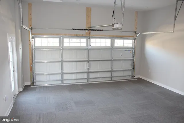 a room with pool table and flat screen tv