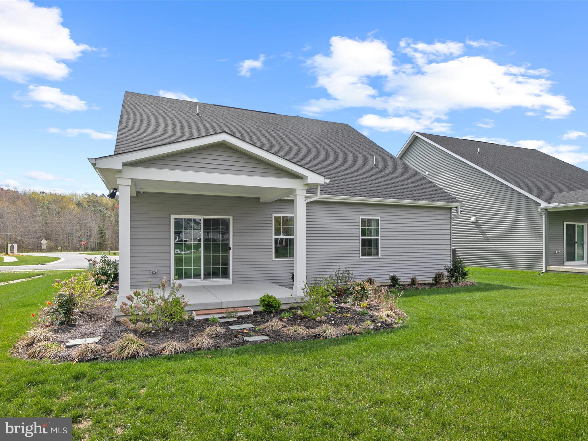 37946 Oneida Way Frankford, DE 19945 - Photo 27 of 29 a front view of a house with a yard and garage