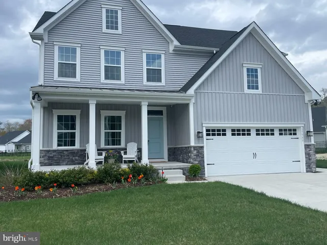 a view of a house with a garden