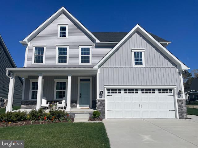 37946 Oneida Way Frankford, DE 19945 - Photo 5 of 29 a view of white house with a yard and plants