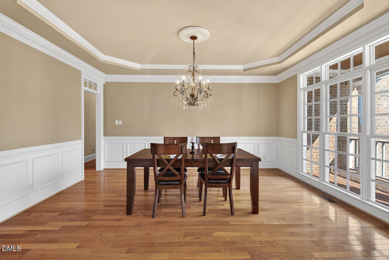 2545 Bittersweet Drive Durham, NC 27705 - Photo 11 of 91 a view of a dining room with furniture window and wooden floor