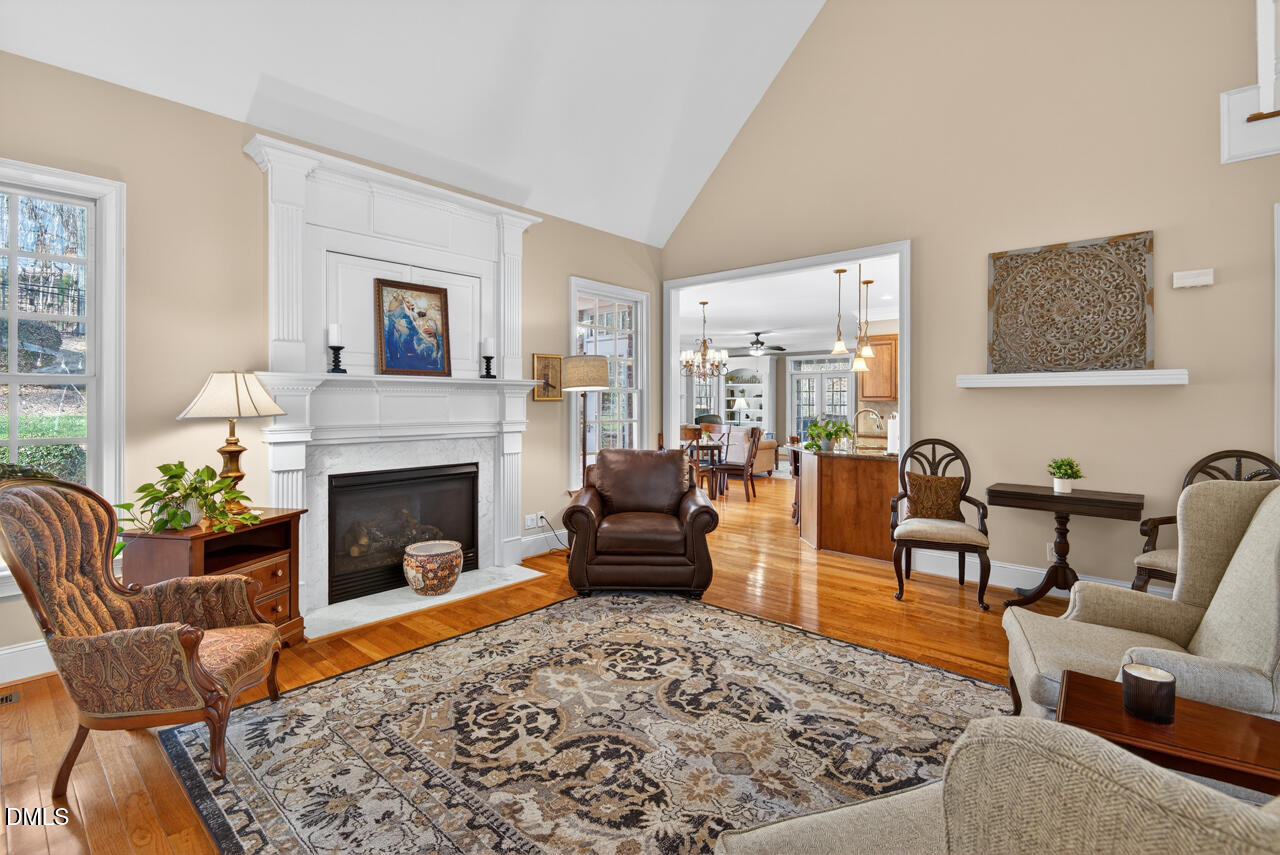 2545 Bittersweet Drive Durham, NC 27705 - Photo 17 of 91 a living room with furniture and a fireplace