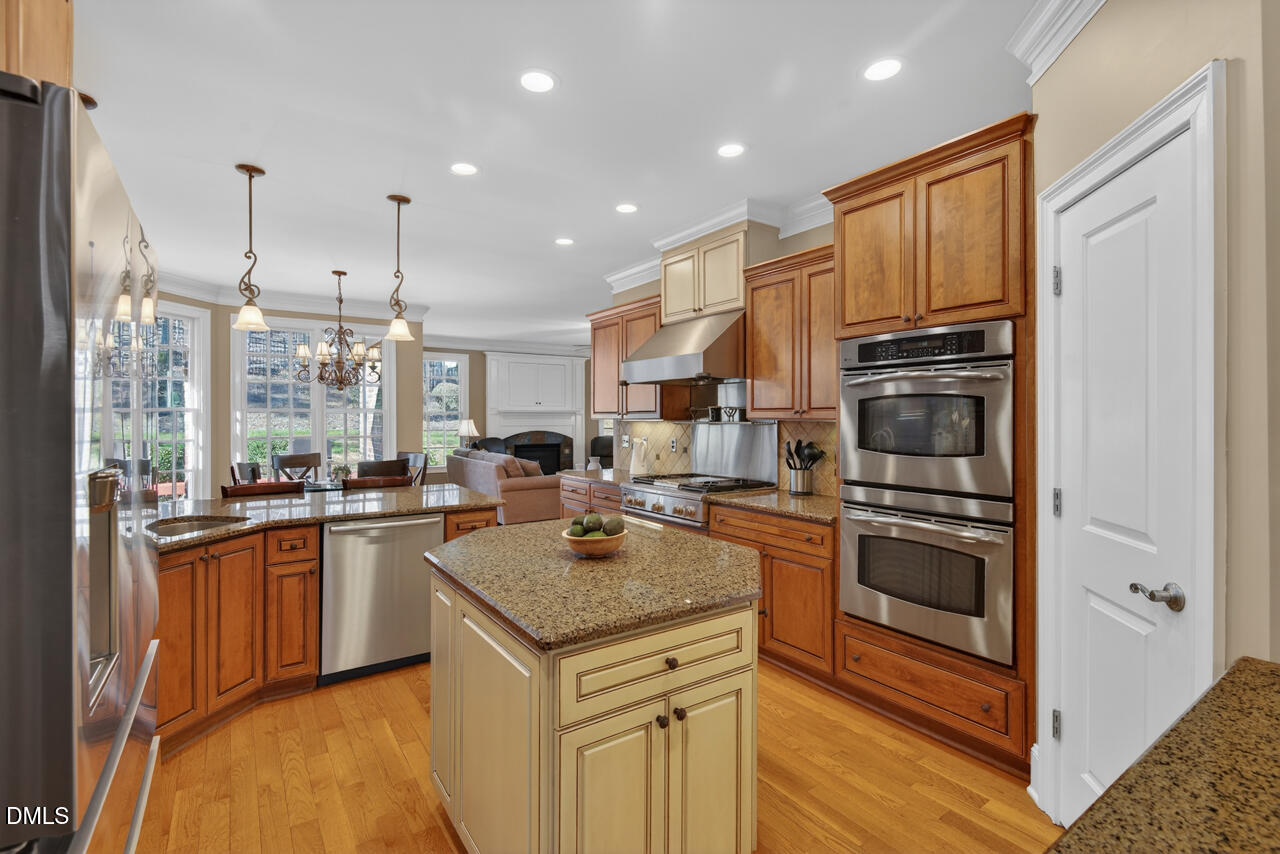 2545 Bittersweet Drive Durham, NC 27705 - Photo 22 of 91 a kitchen with a sink stove and refrigerator