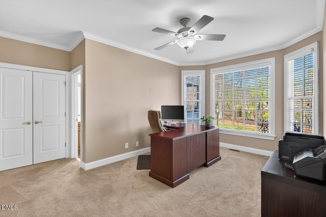 2545 Bittersweet Drive Durham, NC 27705 - Photo 55 of 91 a living room with furniture and a flat screen tv