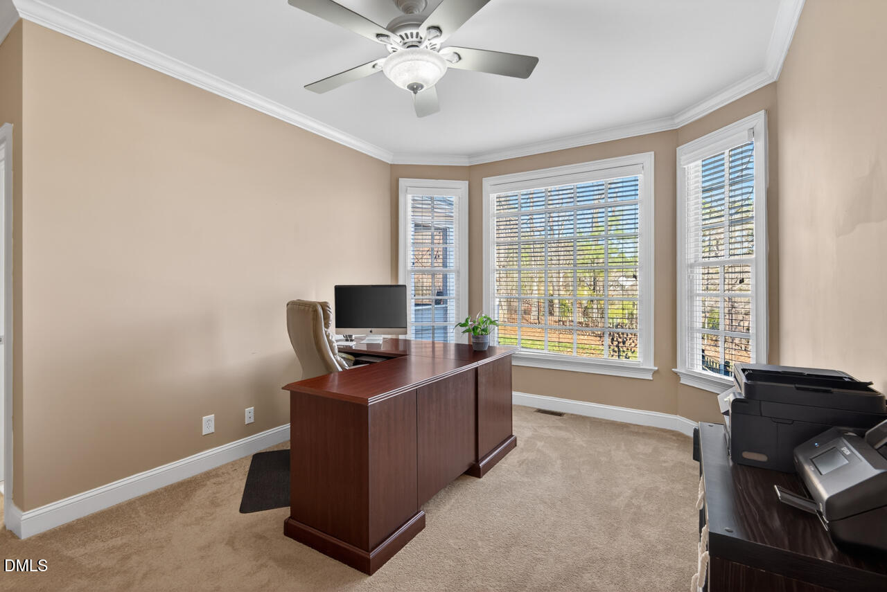 2545 Bittersweet Drive Durham, NC 27705 - Photo 56 of 91 a view of a workspace with furniture and a window