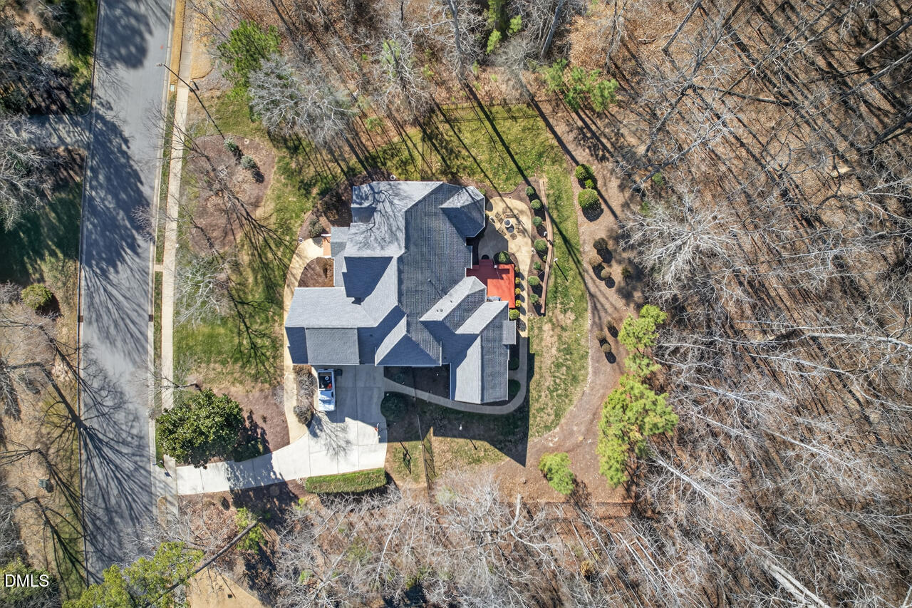 2545 Bittersweet Drive Durham, NC 27705 - Photo 80 of 91 a aerial view of a house with a yard and large trees