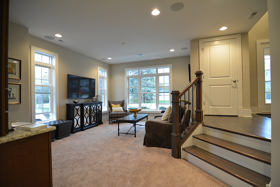 107 Stevens Street Geneva, IL 60134 - Photo 4 of 24 a living room with furniture and a flat screen tv
