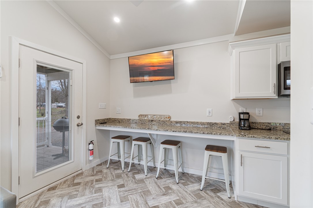 7150 Garner Road, Unit 40 Wolcott, NY 14590 - Photo 7 of 20 Plenty of counter space and WOW! LUXURY VINYL TILE