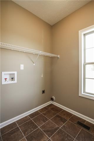12 Chapel Ridge Road Clarksville, TN 37040 - Photo 8 of 17 a view of a room with rack on the wall and a window