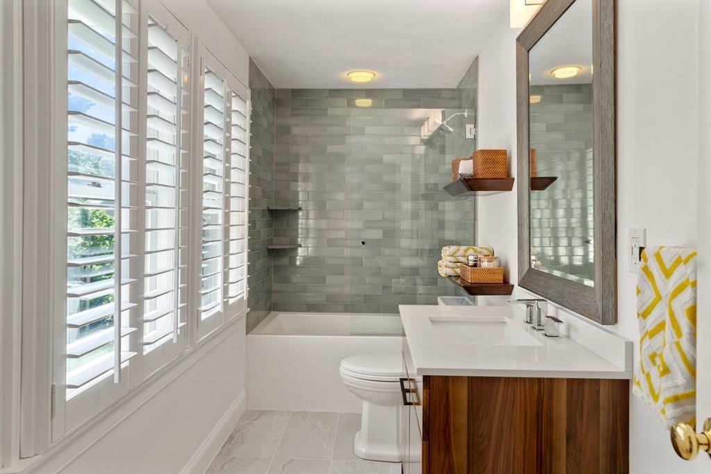 41 Ox Bow Road Weston, MA 02493 - Photo 13 of 26 a bathroom with a granite countertop sink a toilet and shower