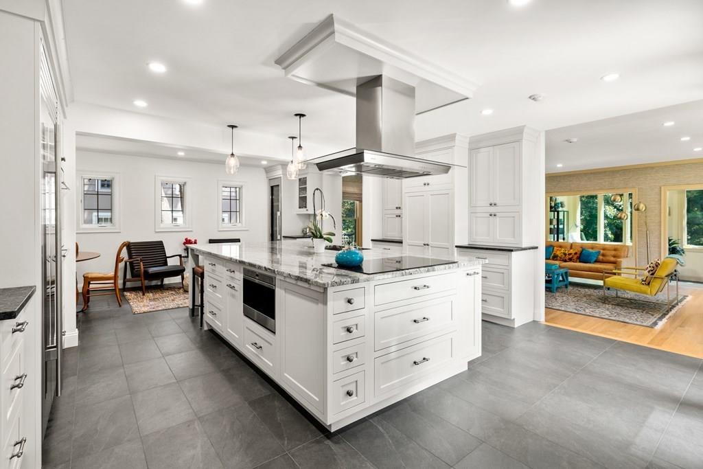 41 Ox Bow Road Weston, MA 02493 - Photo 8 of 26 a kitchen with stainless steel appliances a sink and cabinets