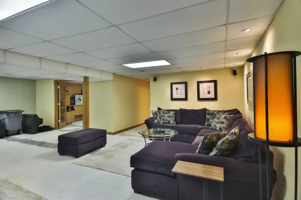 a living room with couches and a couch