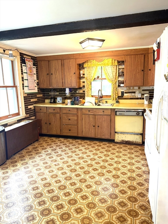 87 Ashfield Road Conway, MA 01341 - Photo 10 of 38 a kitchen with granite countertop a sink and a stove