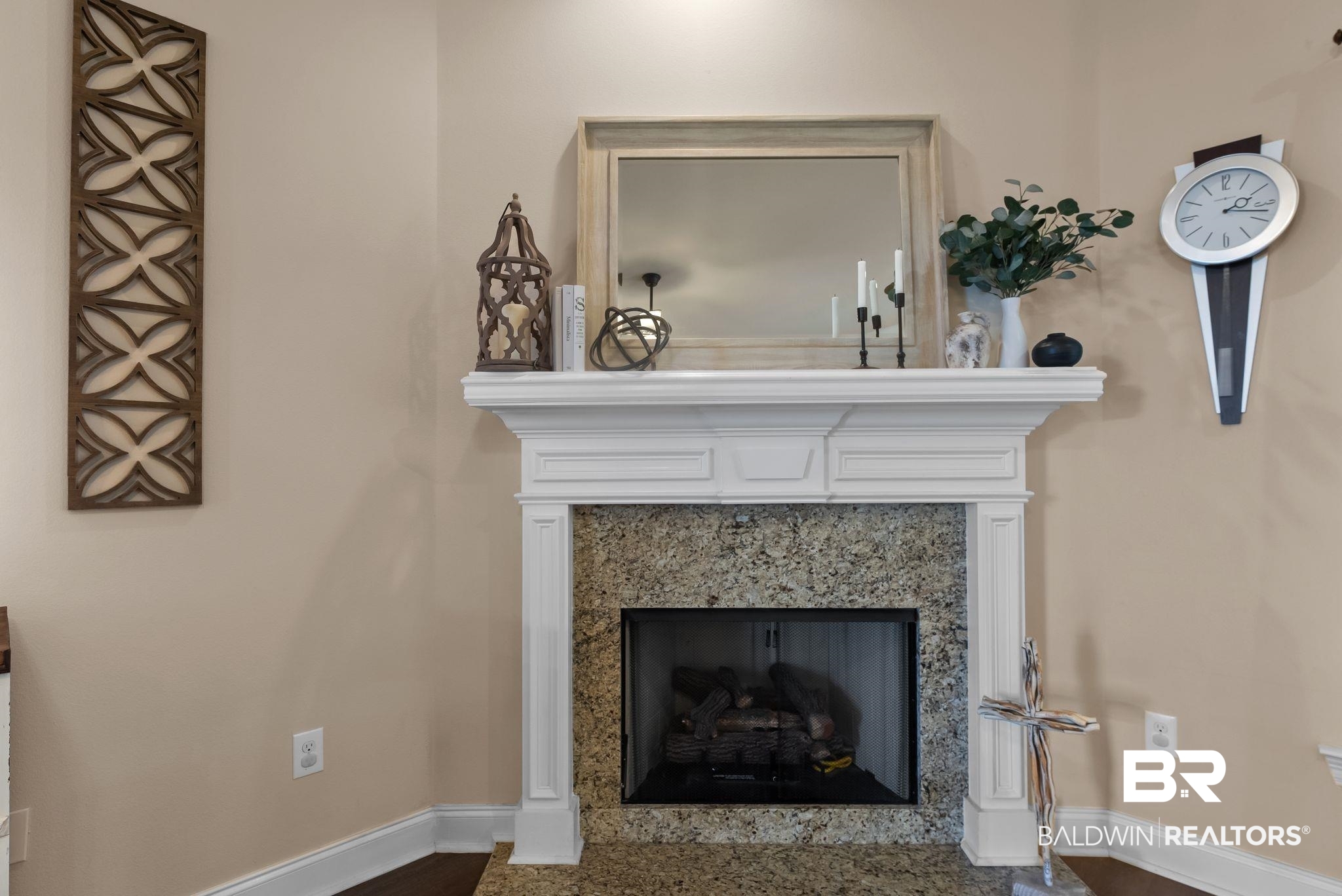 7015 Rocky Rd Loop Gulf Shores, AL 36542 - Photo 12 of 41 Detailed view of a fireplace and wood finished floors