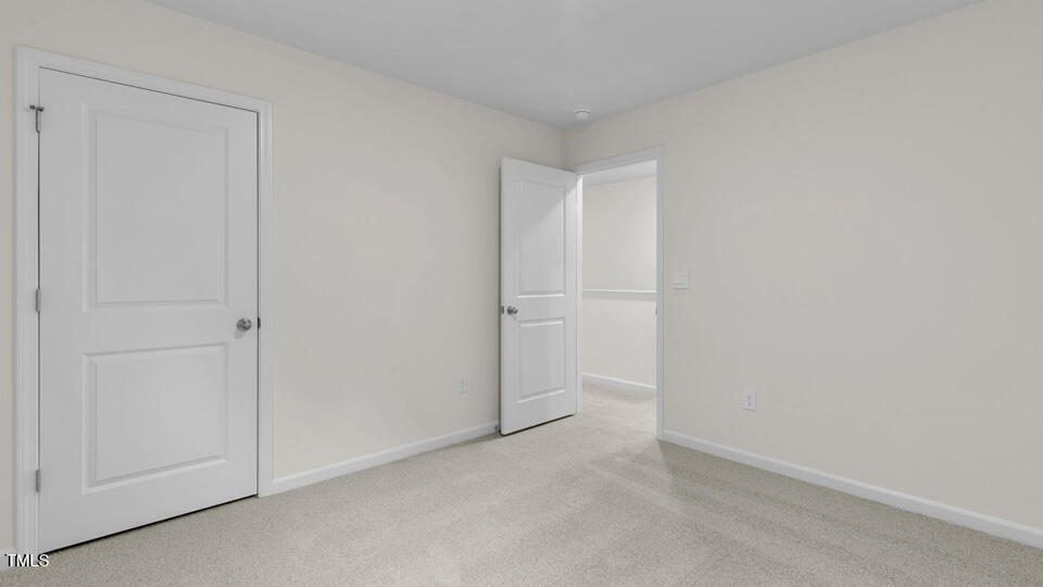 818 Comice Pear Way Willow Spring, NC 27592 - Photo 17 of 44 a view of an empty room