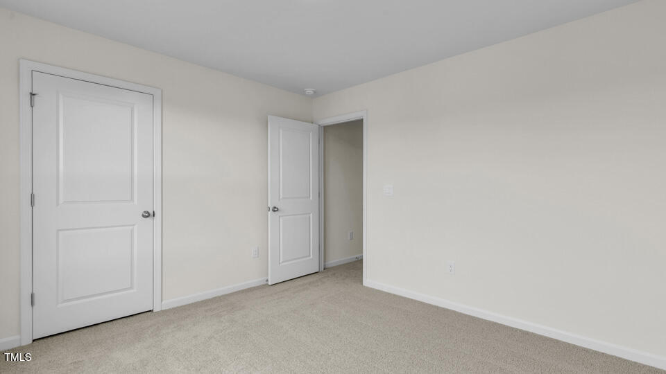 818 Comice Pear Way Willow Spring, NC 27592 - Photo 28 of 44 a view of an empty room