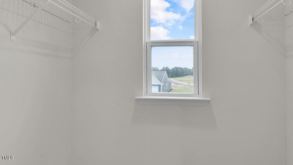 818 Comice Pear Way Willow Spring, NC 27592 - Photo 35 of 44 a view of a window in a room