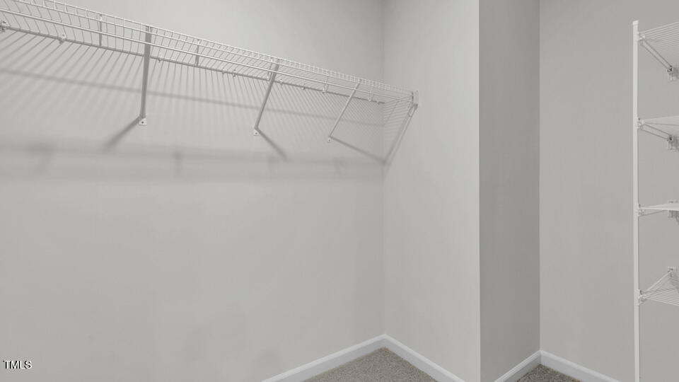 818 Comice Pear Way Willow Spring, NC 27592 - Photo 36 of 44 a view of a rack on the wall
