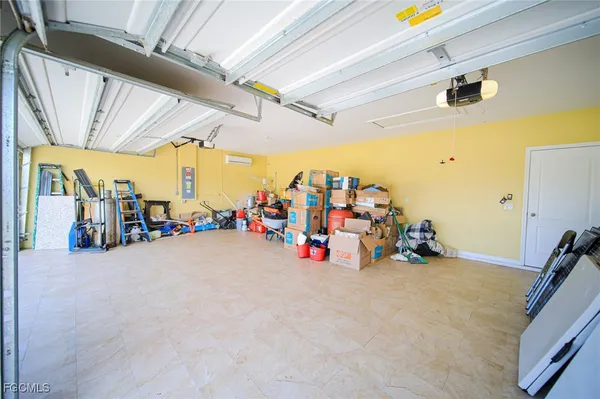 a view of a garage with rack and bicycle