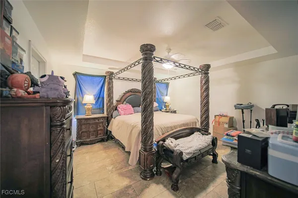 a bed room with furniture and a table