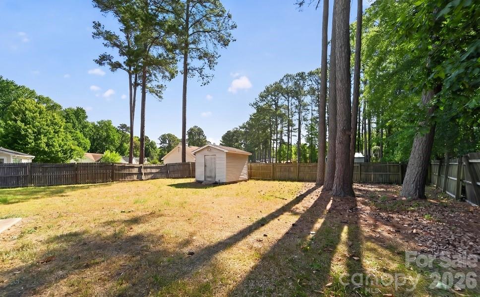 2205 Old Sparta Road Rocky Mount, NC 27804 - Photo 25 of 25 a house with trees in front of it