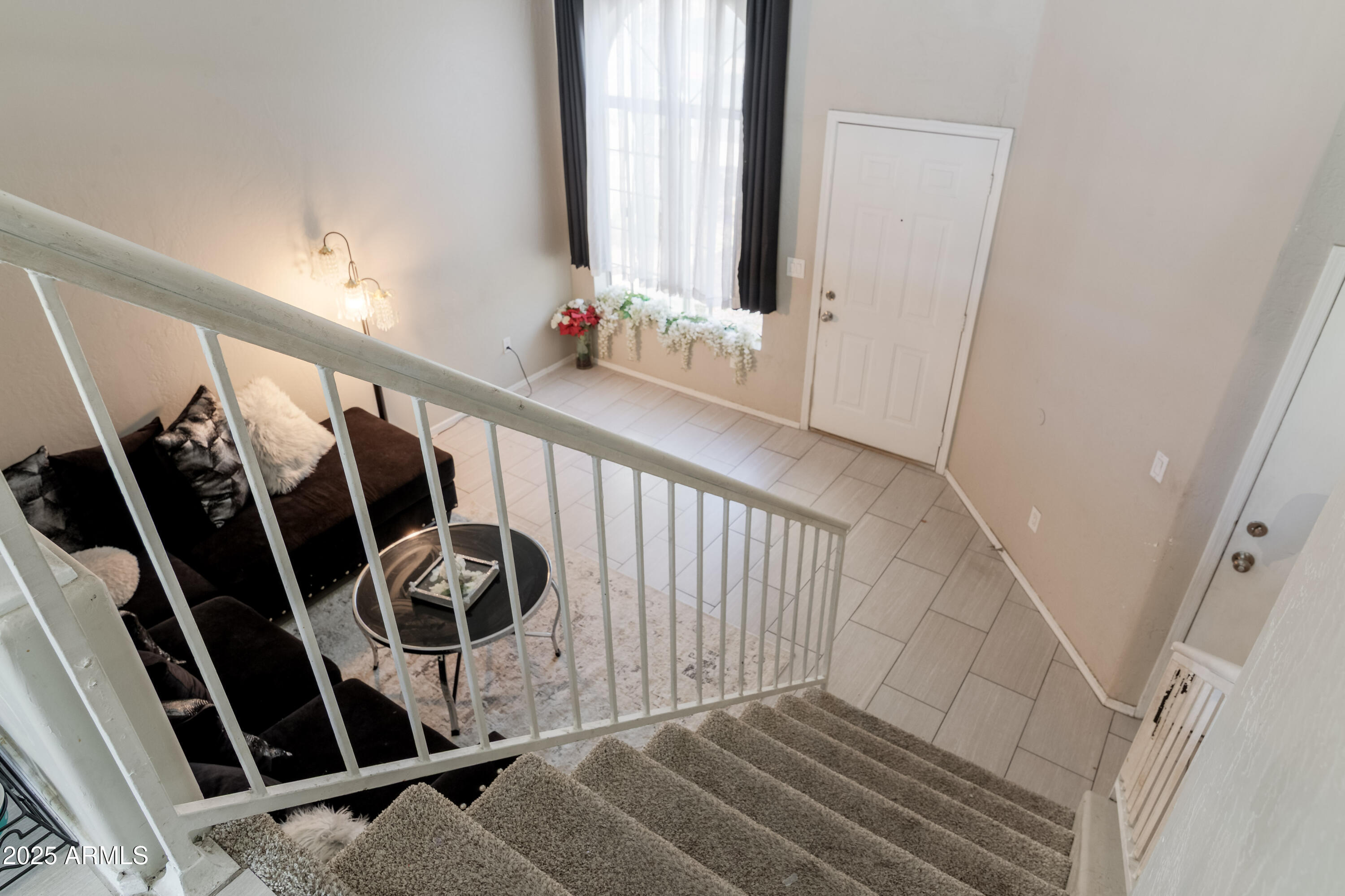 3755 East Broadway Road, Unit 36 Mesa, AZ 85206 - Photo 16 of 24 a view of stairs and white door