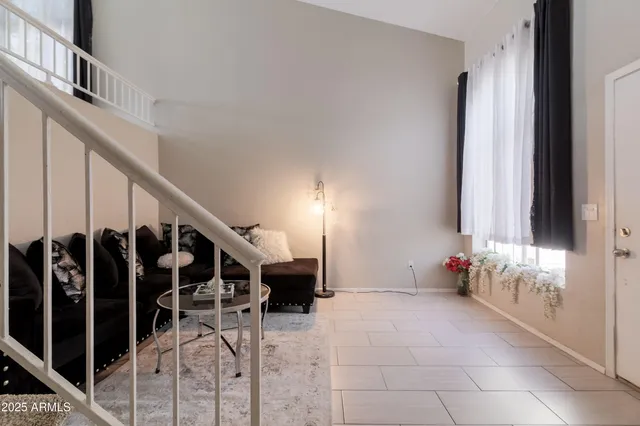 a view of stairs and an entryway