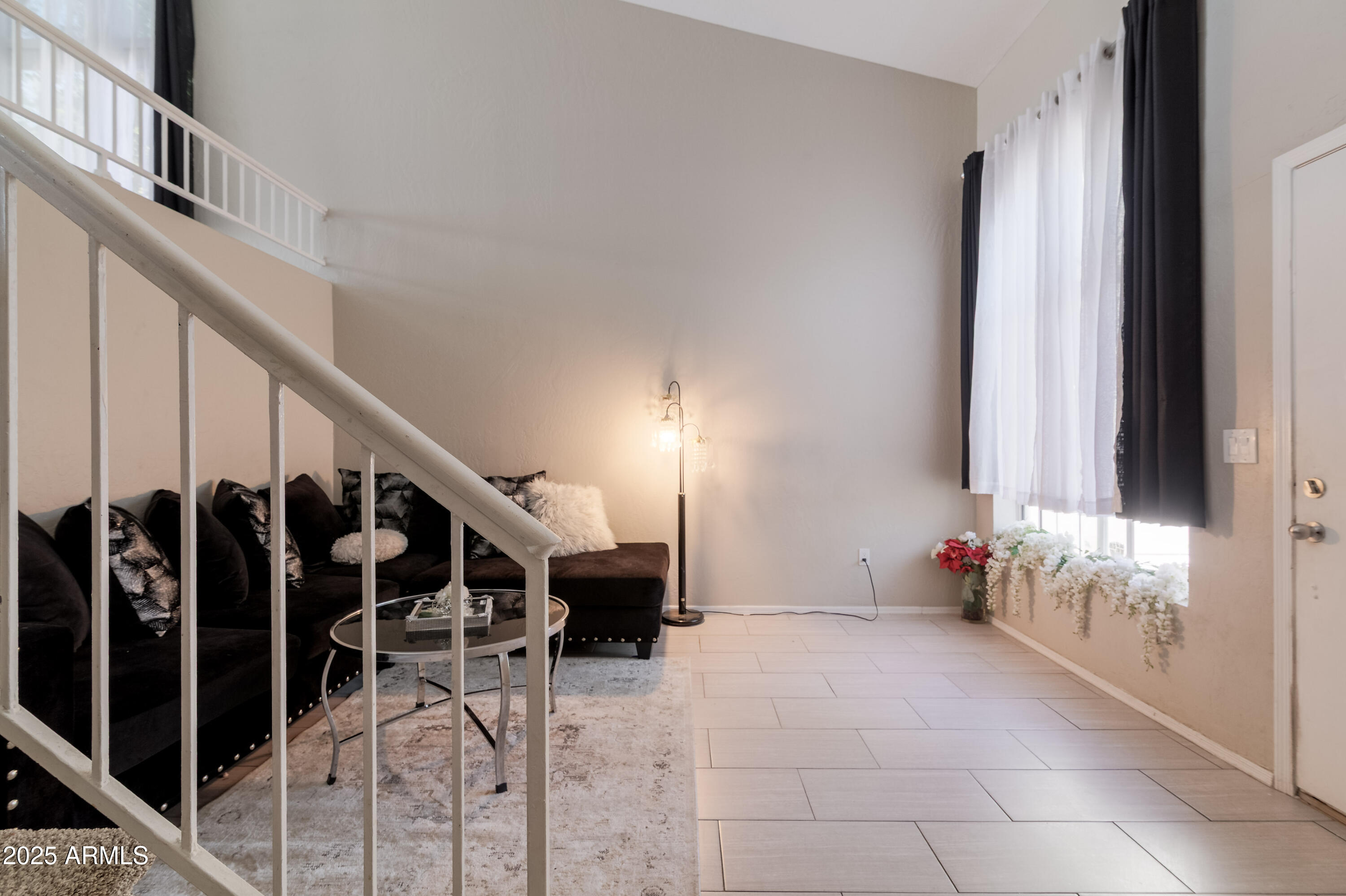 3755 East Broadway Road, Unit 36 Mesa, AZ 85206 - Photo 5 of 24 a view of stairs and an entryway