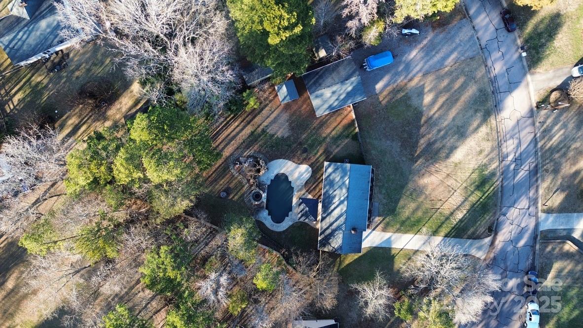 2411 Sutters Road Concord, NC 28027 - Photo 26 of 27 a view of a street with plants